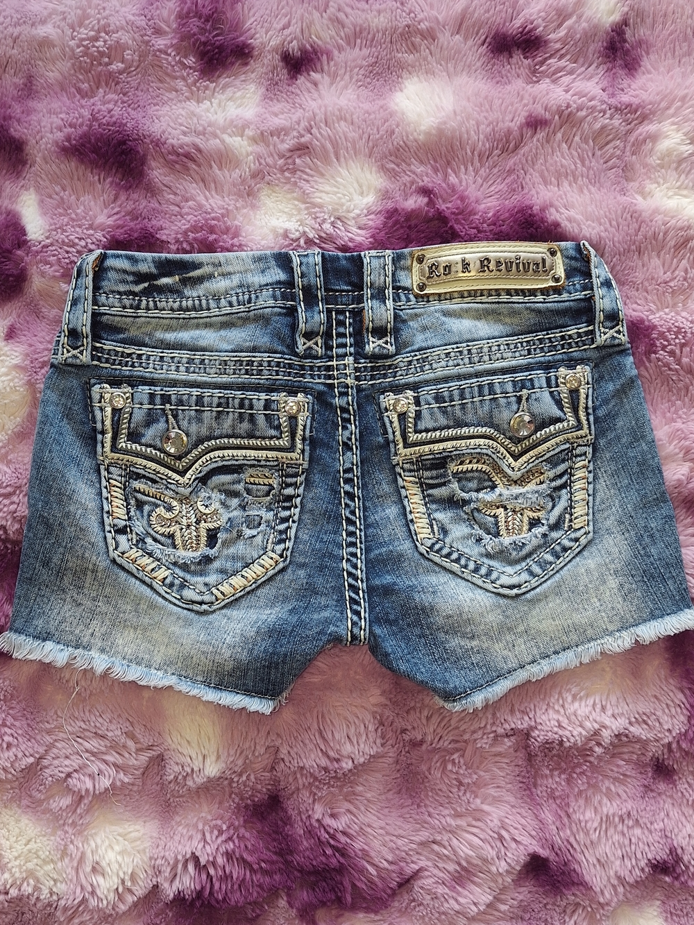 Rock Revival Women's Distressed Denim Shorts in Blue